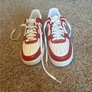 These are Air Force 1’s,never touched,red design and a size 8